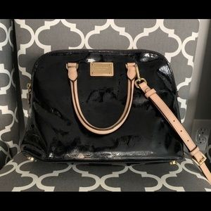 SALEMichael Kors black patent leather handbag.
